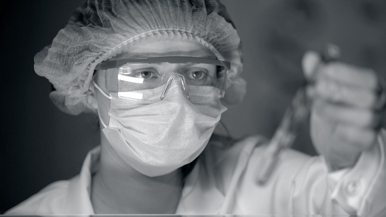 A researcher performing test on the biofuel