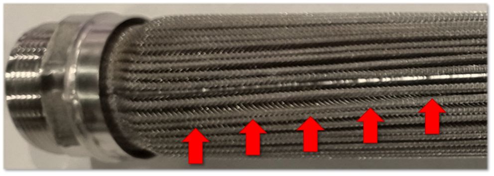 Example of media sleeve twisting affecting filtration performance in high-viscosity polymer melt processing
